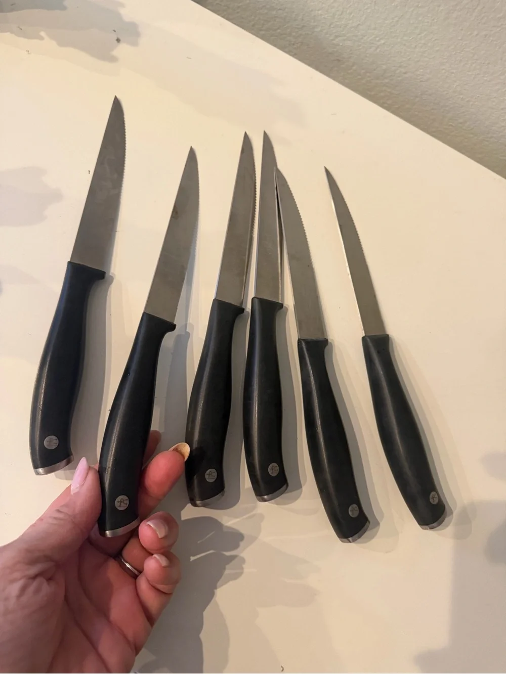Set of 8 Henckels Cuttery Knives with Black  Handle